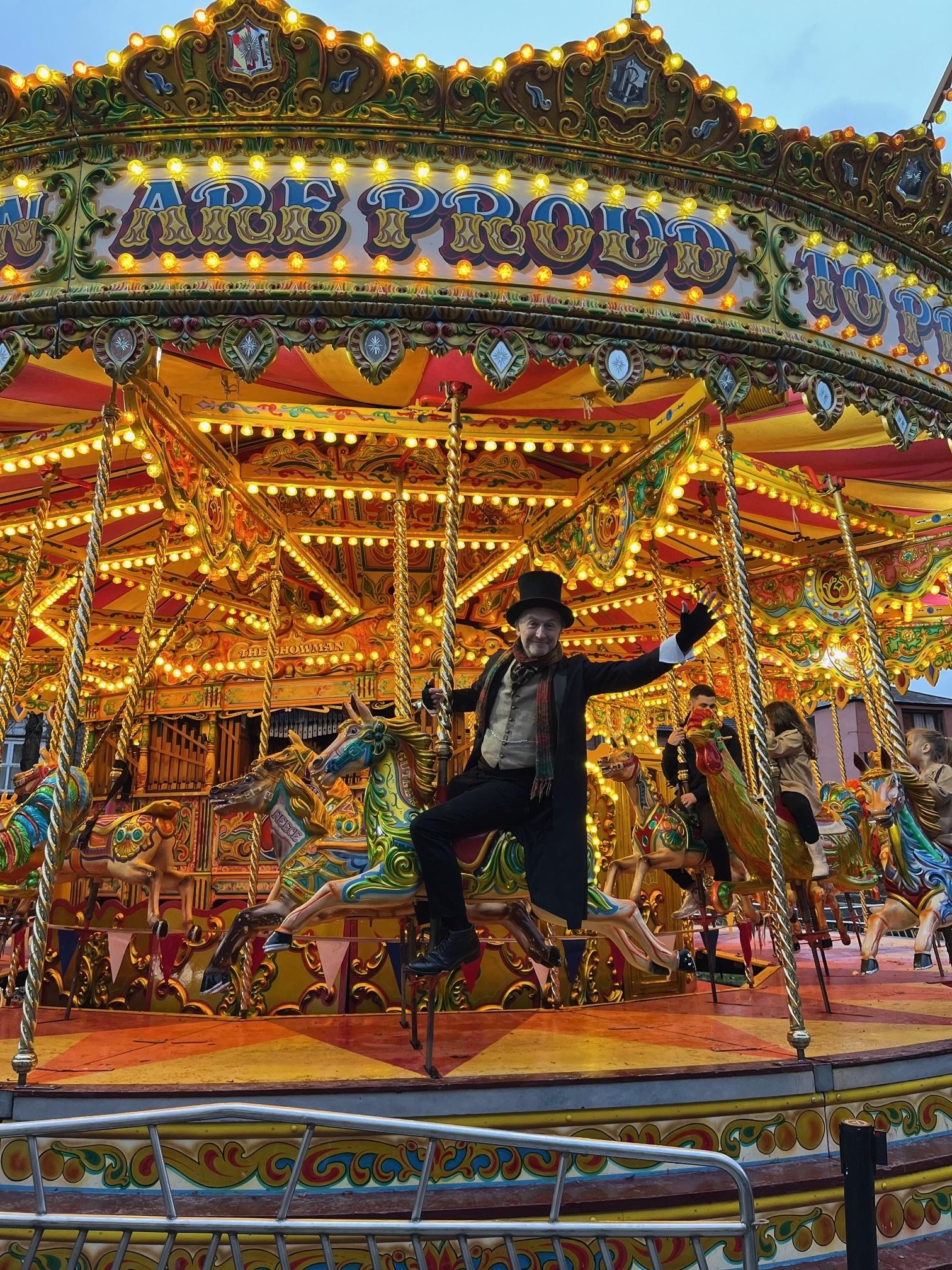 A man on a carousel