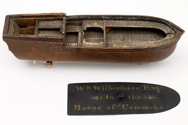 A wooden model of a slave ship