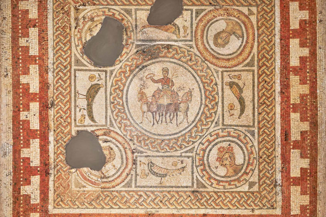 A roman mosaic depicting a charioteer Mosaic