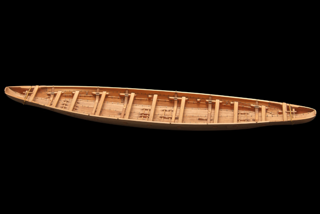 A wooden model of a boat