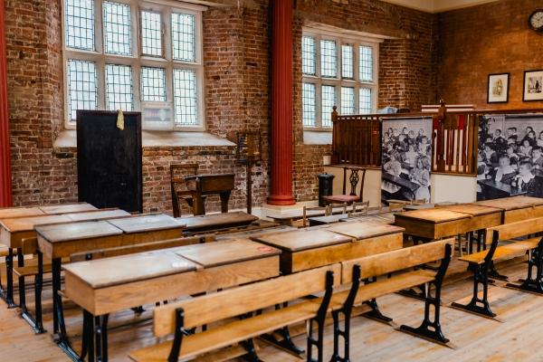 Wooden desks and chairs