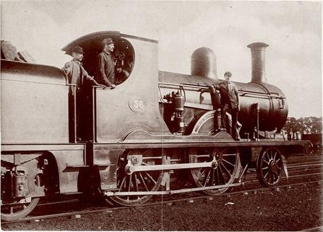 A black and white photograph of a steam engine.