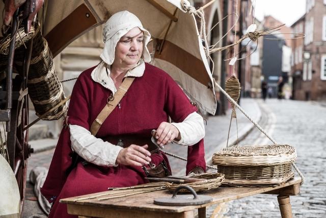 A woman basket weaving