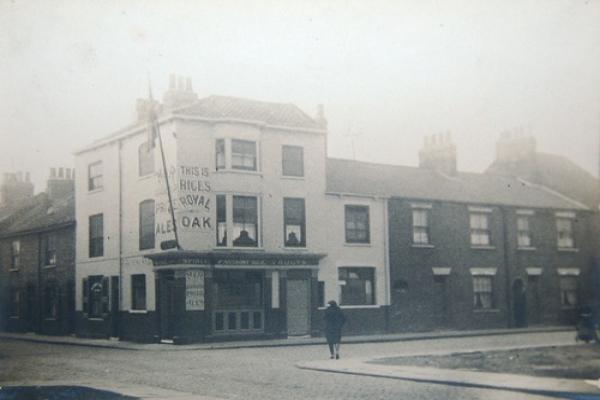 A black and white photo of a pub.