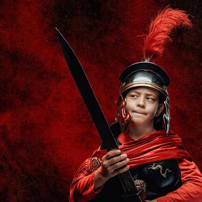 A boy dressed as a Roman soldier