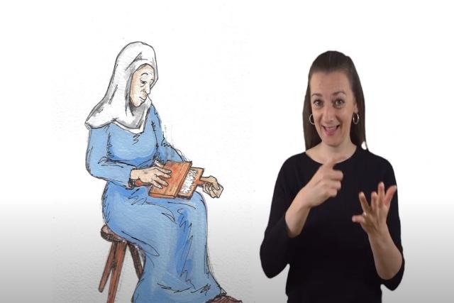 A still photo from a video with a BSL interpreter