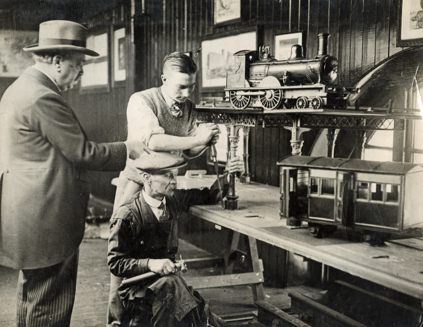 Black and white photo of two people at the Hull Railway Museum