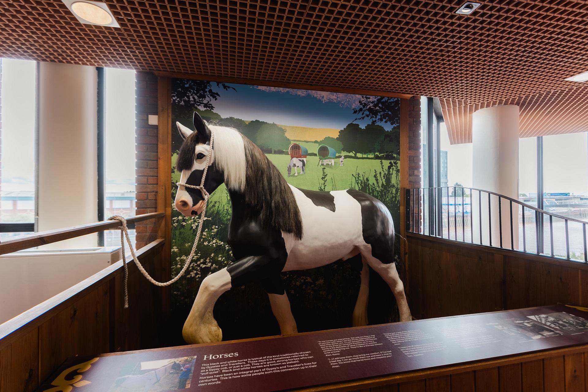 Model of a black and white horse