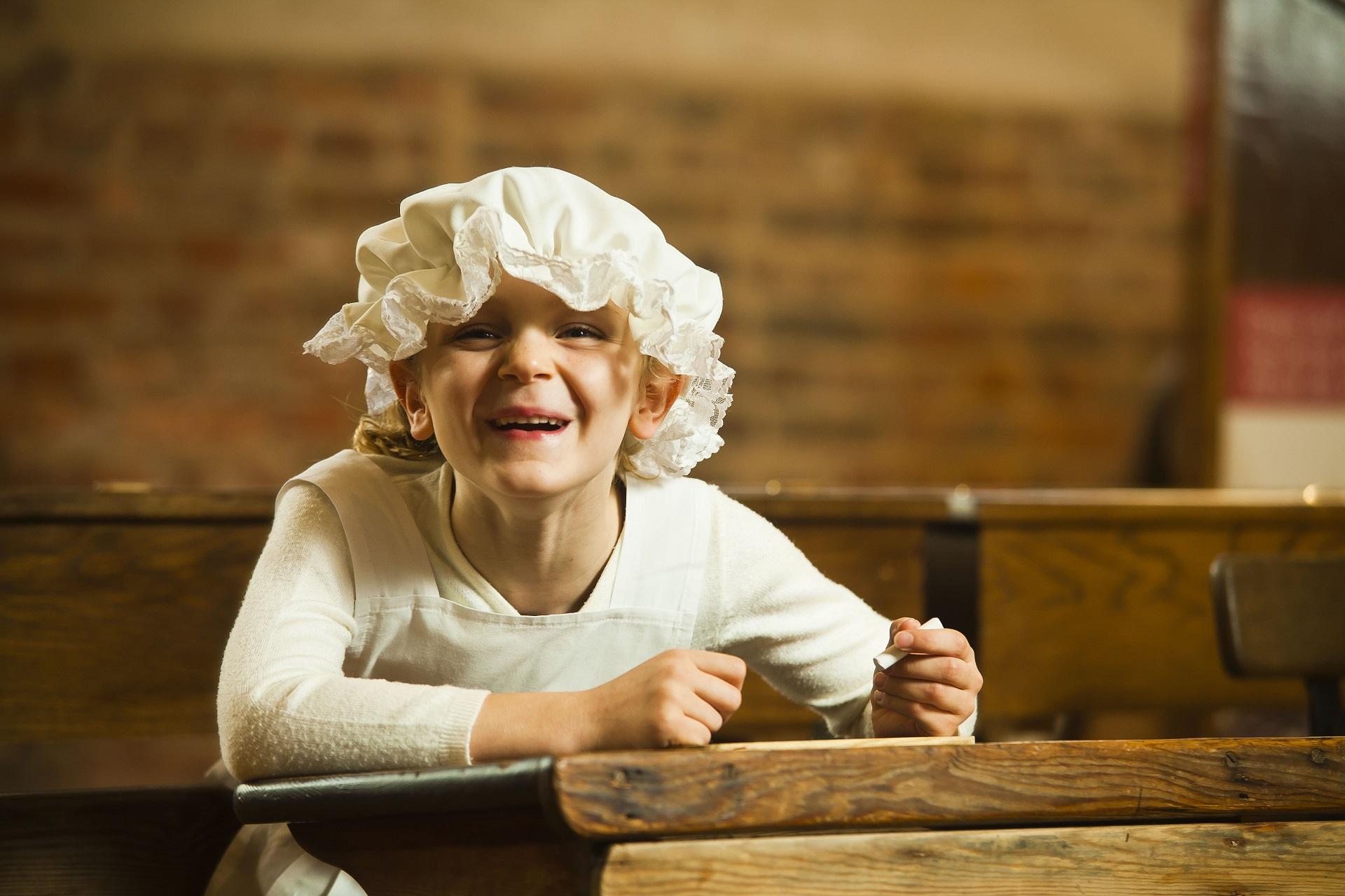 Victorian girl in mop cap