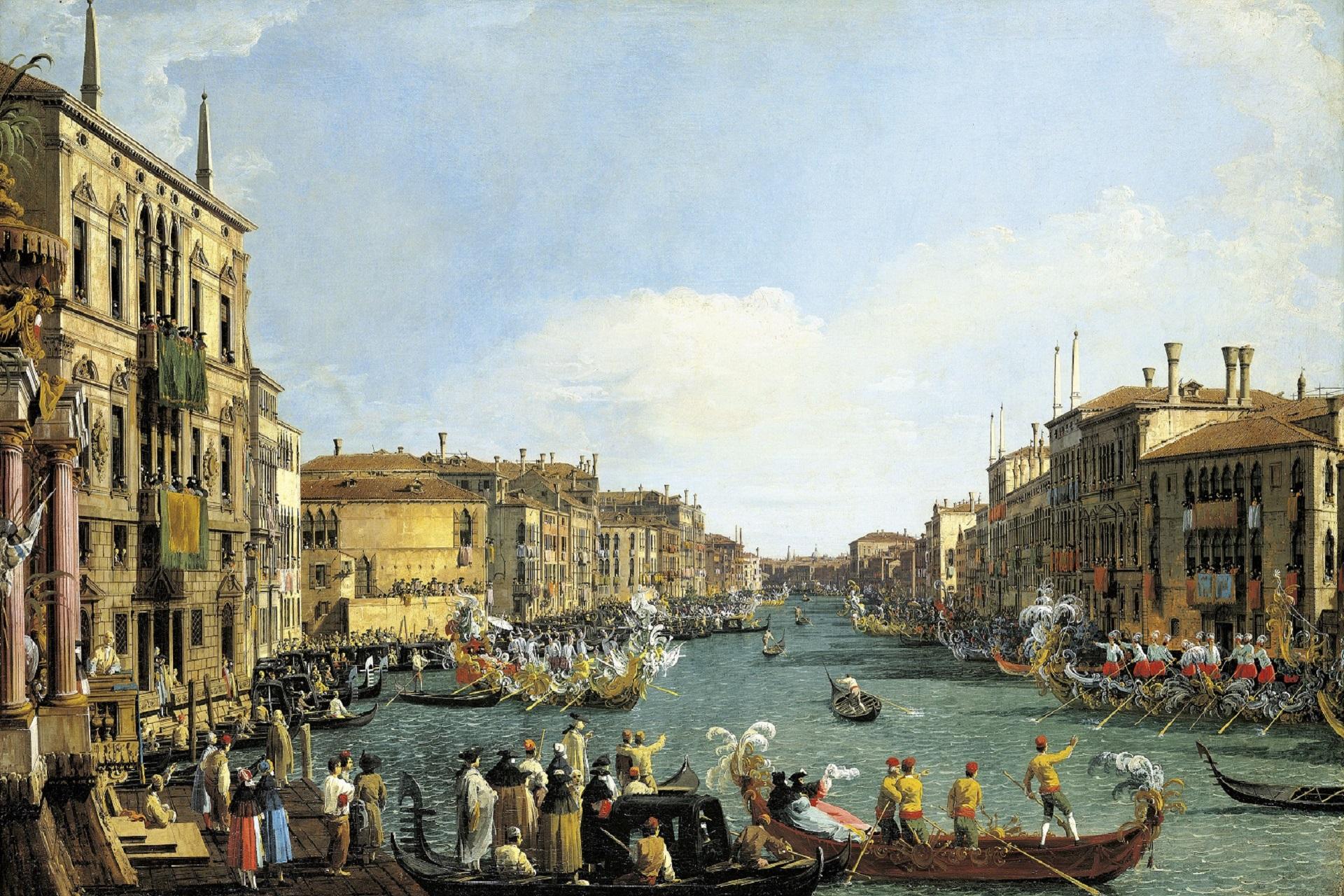 A painting of a Venice canal scene. There are buildings lining the canal and lots of boats on the water