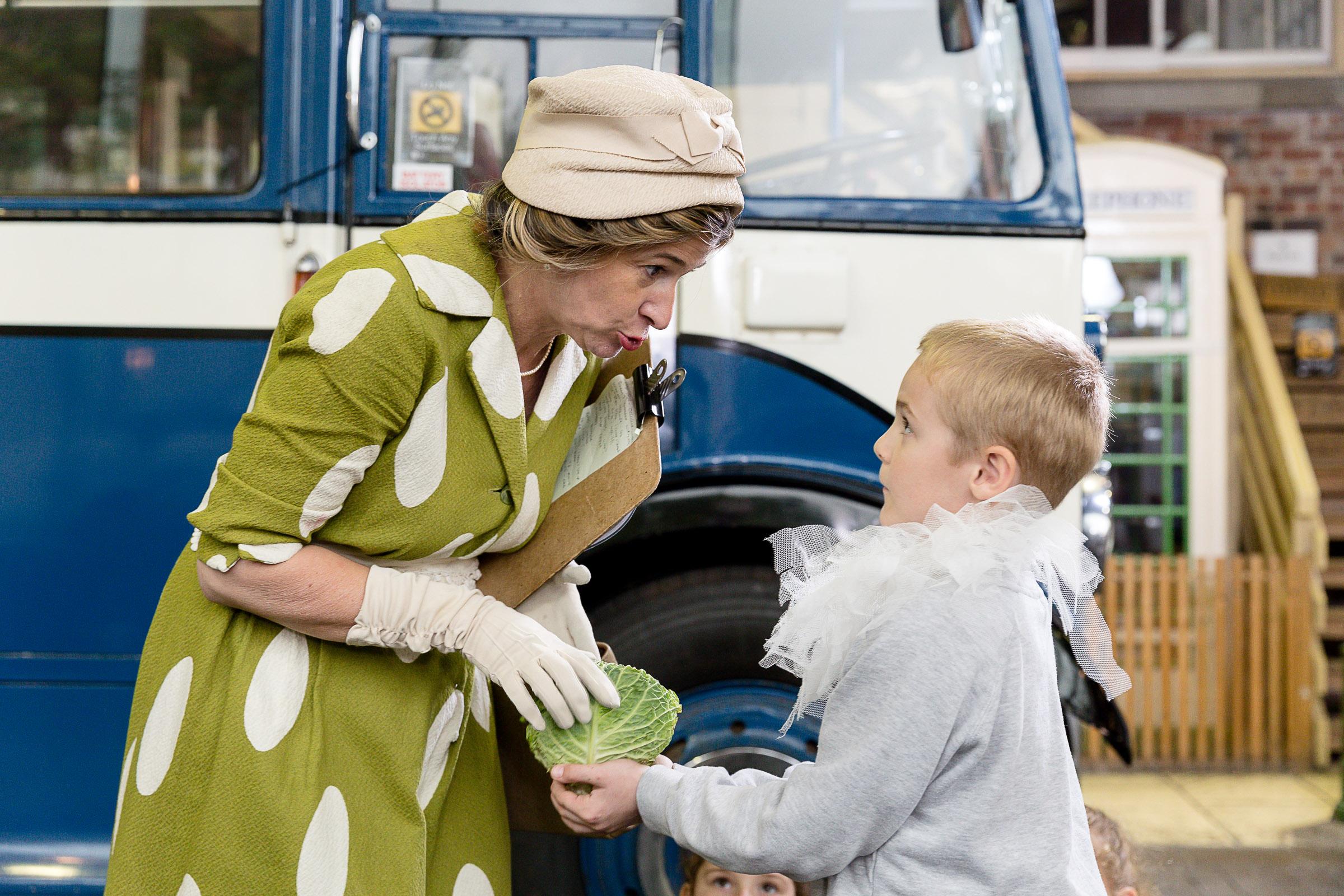 A woman and boy in 50s clothing